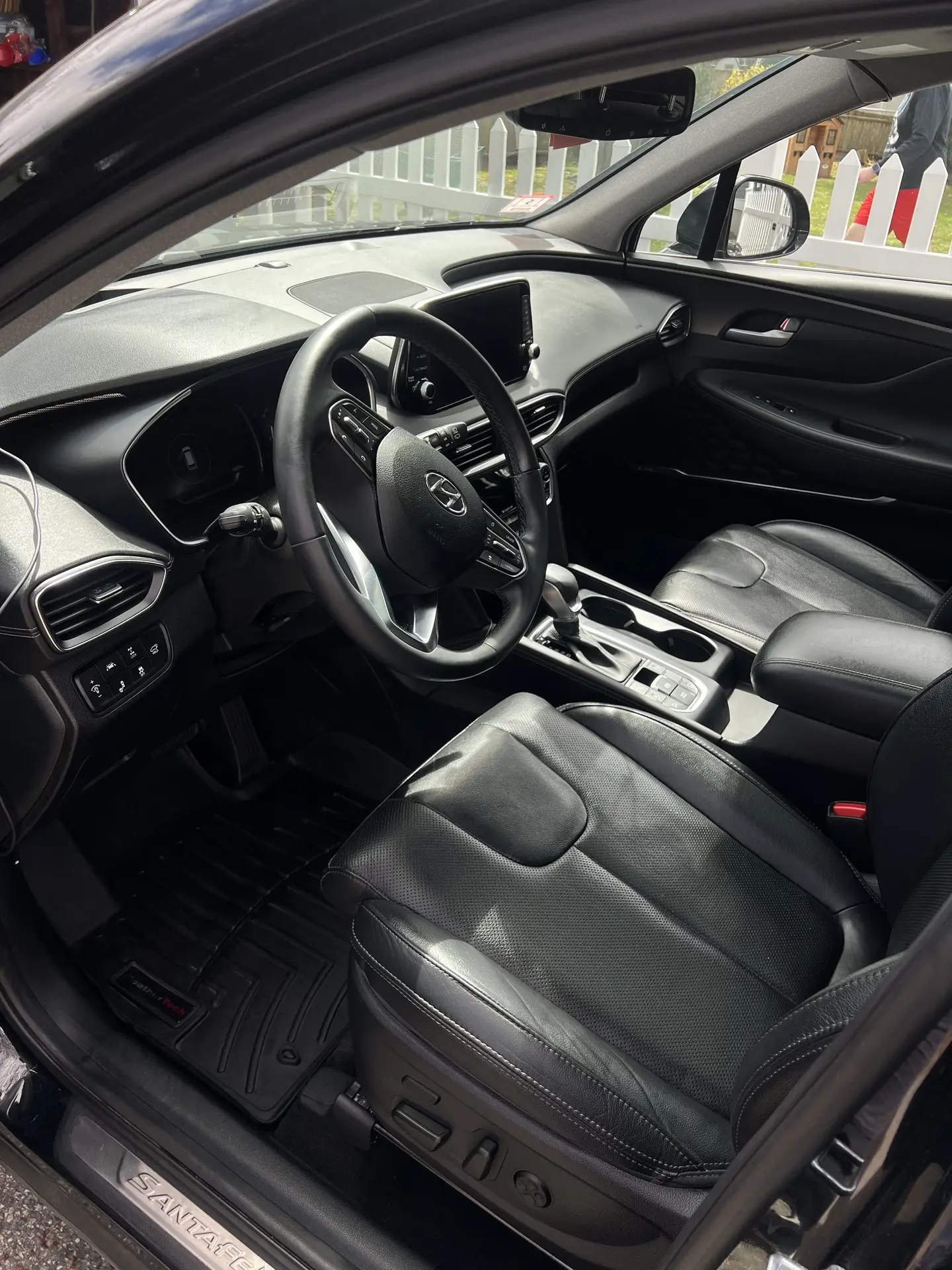 Clean black leather seats and cabin in a Hyundai SUV